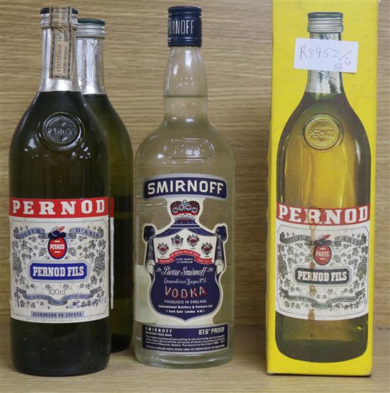 Three bottles of Pernod and one of Vodka
